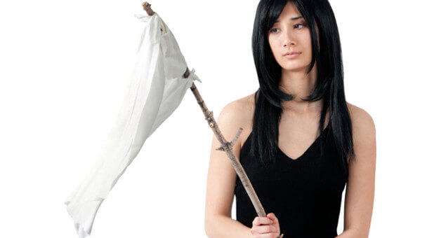 woman holding white flag