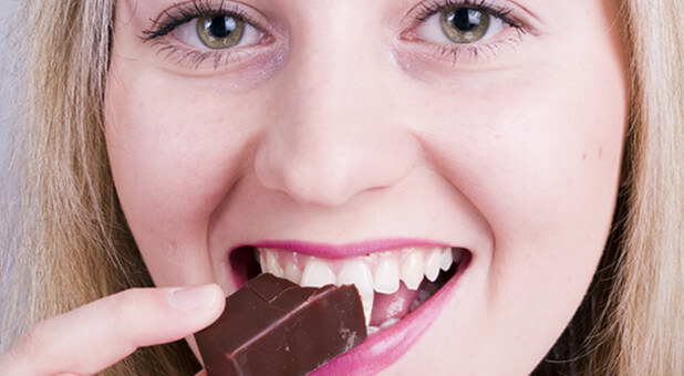 woman eating chocolate