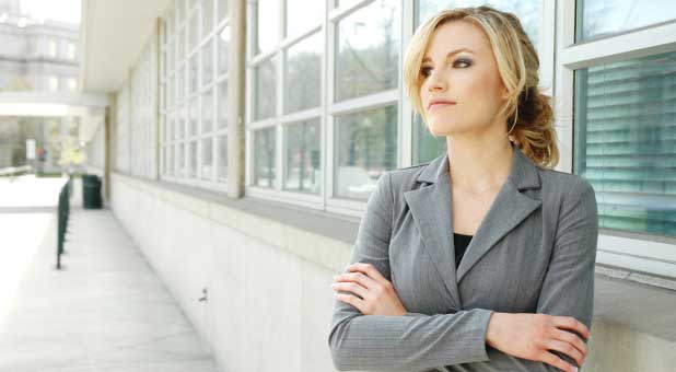 woman in front of office building