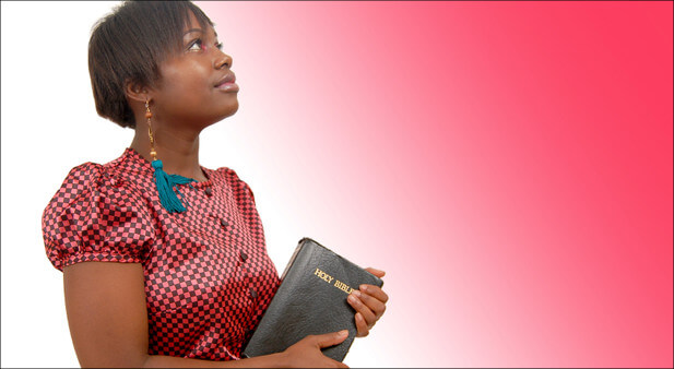 woman holding the Bible