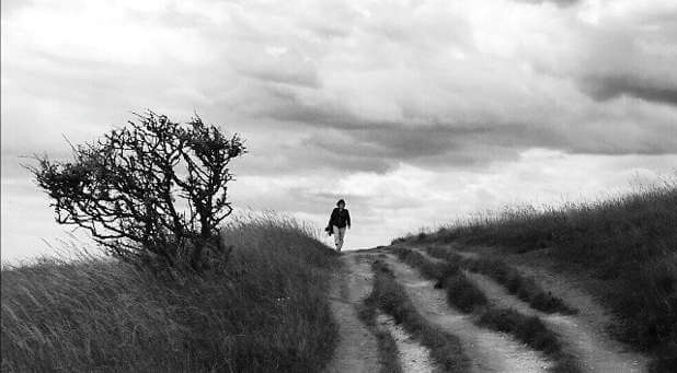 woman walking in a storm