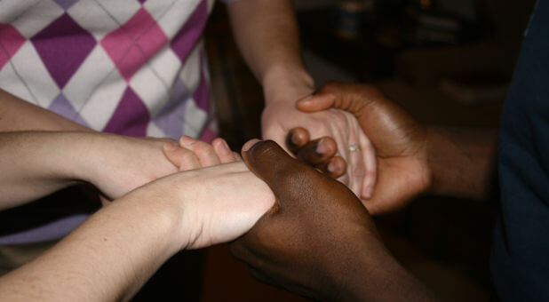 people praying together