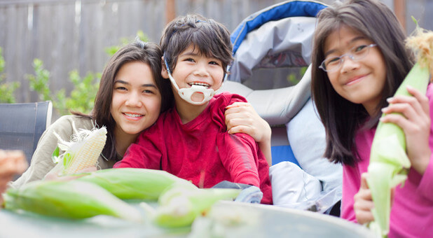 special needs child with friends