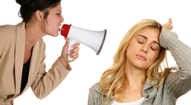 woman screaming in megaphone