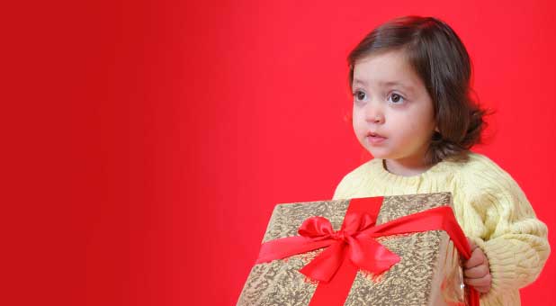 The holidays are a prime season for giving to your child. Here's how to make sure that you're not giving too much.