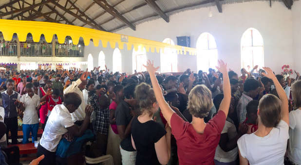 Dozens of people were baptized in the Holy Spirit in this Anglican youth service last week in Kabwohe, Uganda.