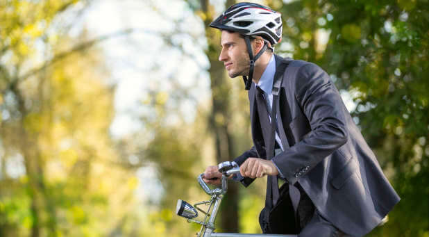 Bicycling to work can help you lose weight and lower your body mass index.