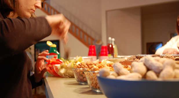 Resist the temptation to overeat during the holidays with these tips.